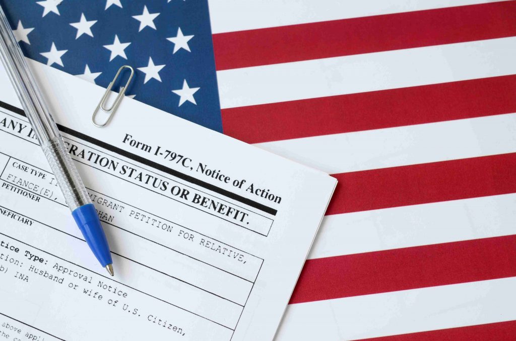 Immigration Form and U.S. Flag