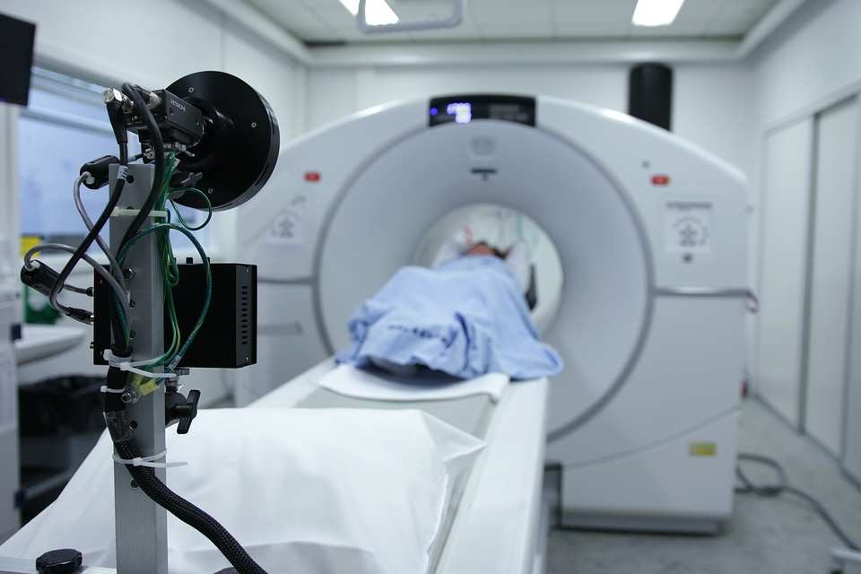 car accident patient in CT scan machine